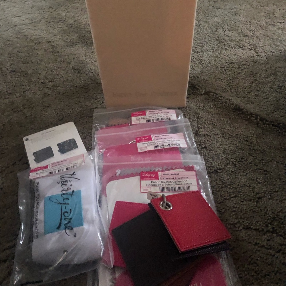 Thirty One Consultant bundle.  Selling supplies/ swatches, necklace holder.